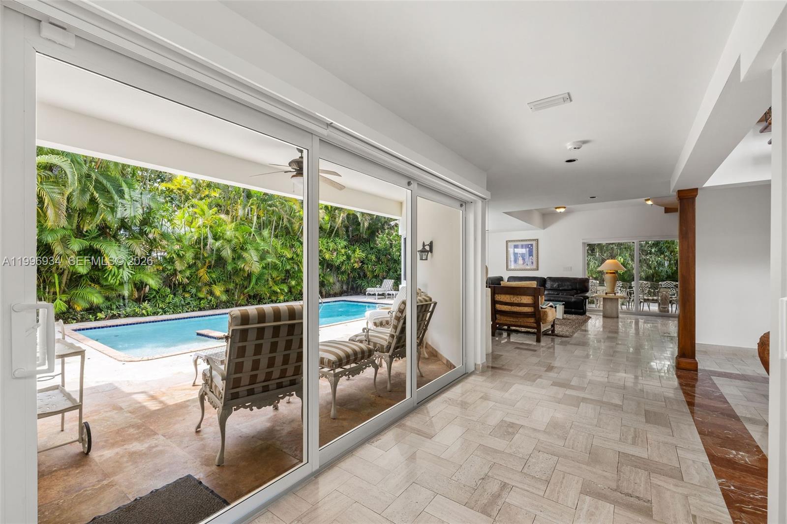 8450 Southwest 74th Terrace Miami, FL 33143 - Photo 19 of 54 a view of a dining room with furniture window and outside view