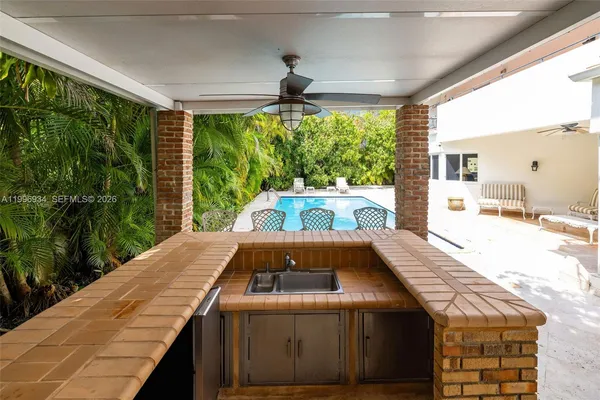 a view of a back yard of the house