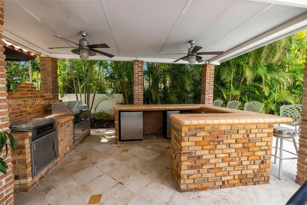 a view of an outdoor dining space with furniture