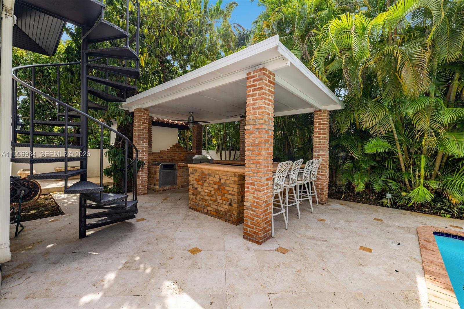 8450 Southwest 74th Terrace Miami, FL 33143 - Photo 26 of 54 a view of outdoor sitting area with furniture and garden