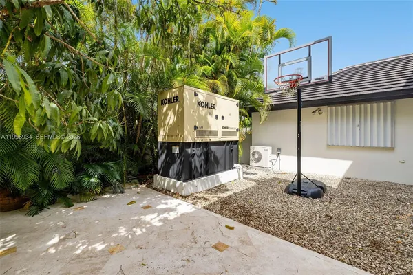 a bed room with a bed and a large window