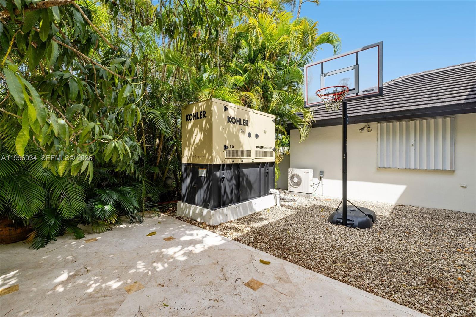 8450 Southwest 74th Terrace Miami, FL 33143 - Photo 27 of 54 a view of a back yard of the house