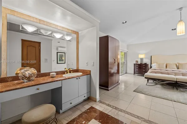 a view of swimming pool with seating area