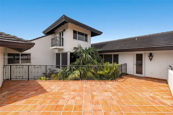 a bathroom with a double vanity sink and mirror