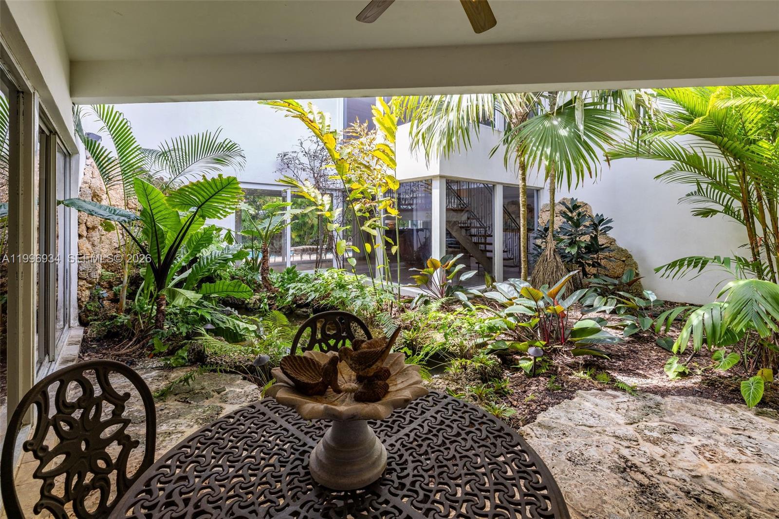 8450 Southwest 74th Terrace Miami, FL 33143 - Photo 38 of 54 a view of a potted plants on a patio