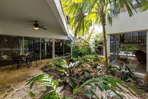 a spacious bathroom with a double vanity sink and a mirror