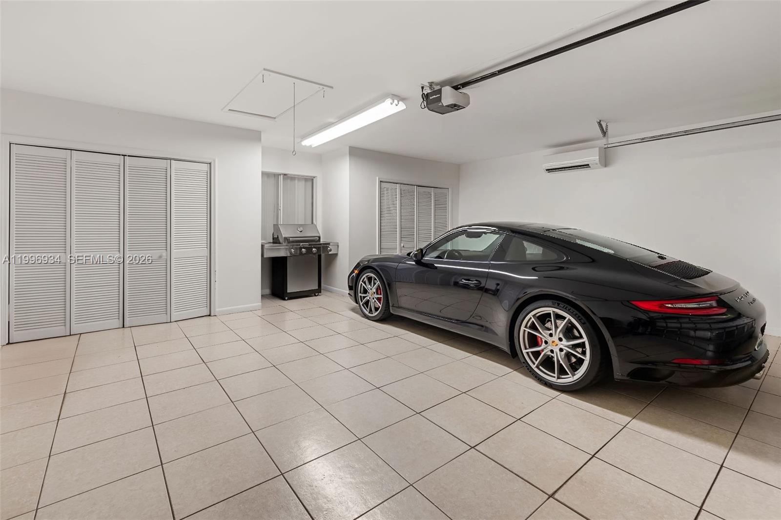 8450 Southwest 74th Terrace Miami, FL 33143 - Photo 52 of 54 a view of a car garage