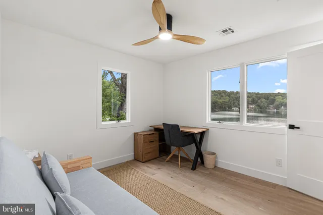 a workspace with furniture and window