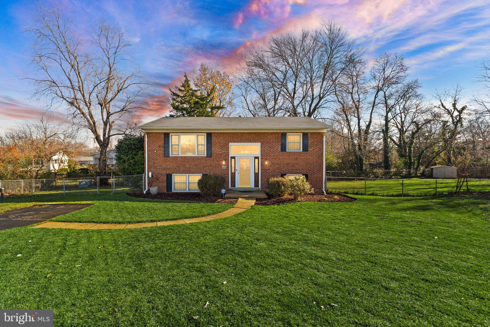 6101 Briarview Court Alexandria, VA 22310 - Photo 1 of 44 a front view of a house with garden