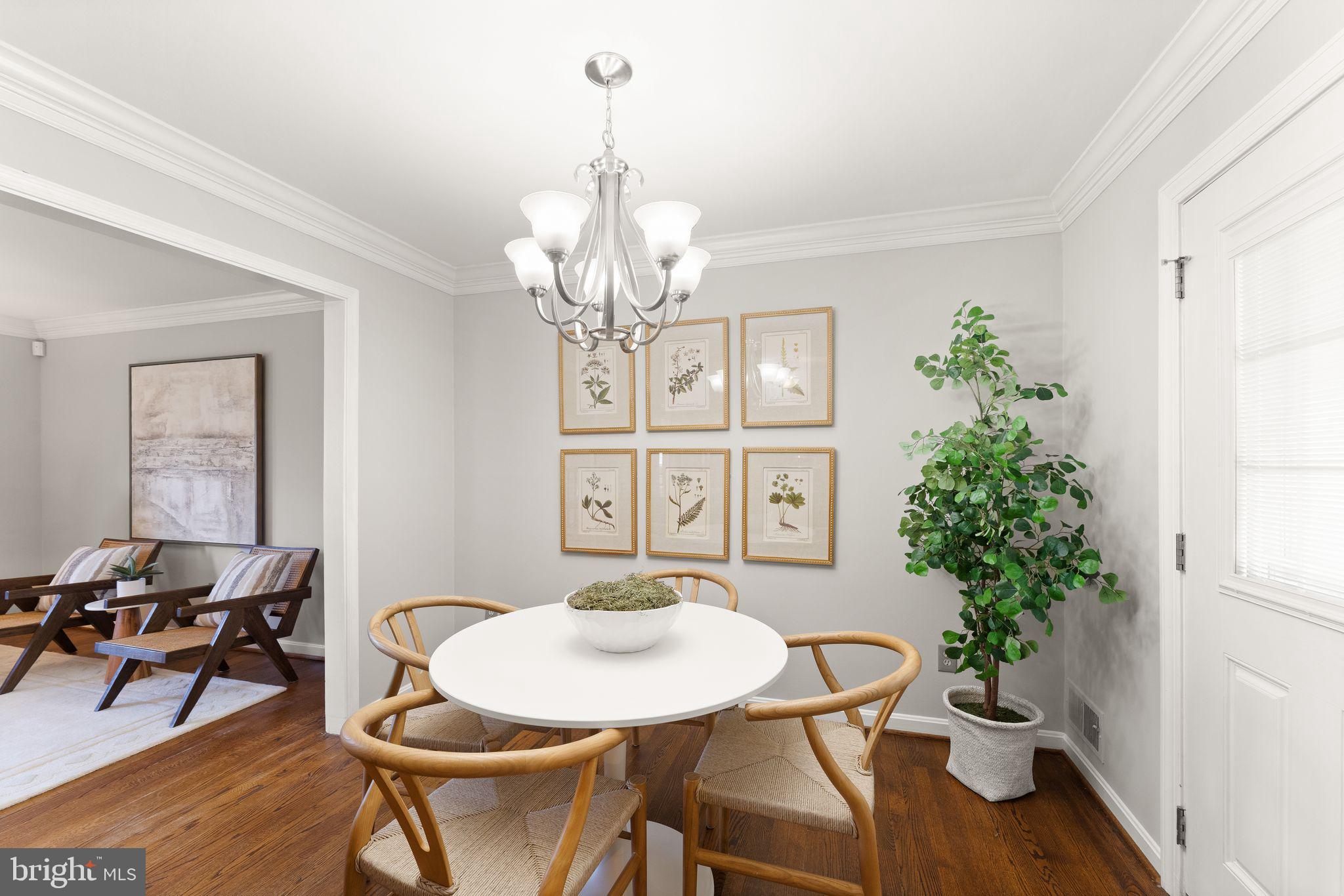 6101 Briarview Court Alexandria, VA 22310 - Photo 11 of 44 a view of a dining room with furniture wooden floor and chandelier