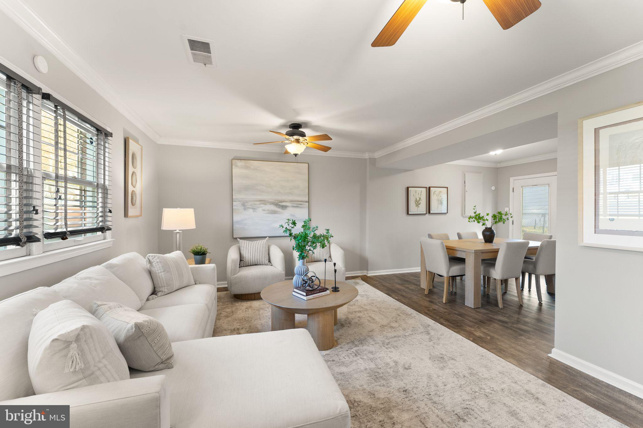 6101 Briarview Court Alexandria, VA 22310 - Photo 24 of 44 a living room with furniture and a large window