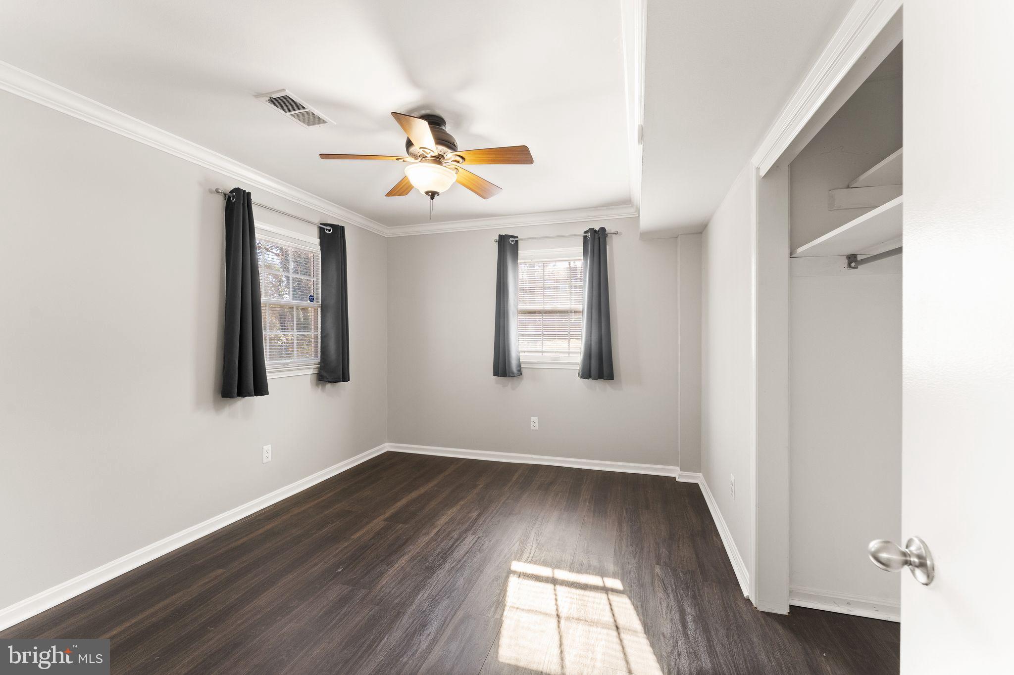 6101 Briarview Court Alexandria, VA 22310 - Photo 33 of 44 wooden floor in an empty room with a window