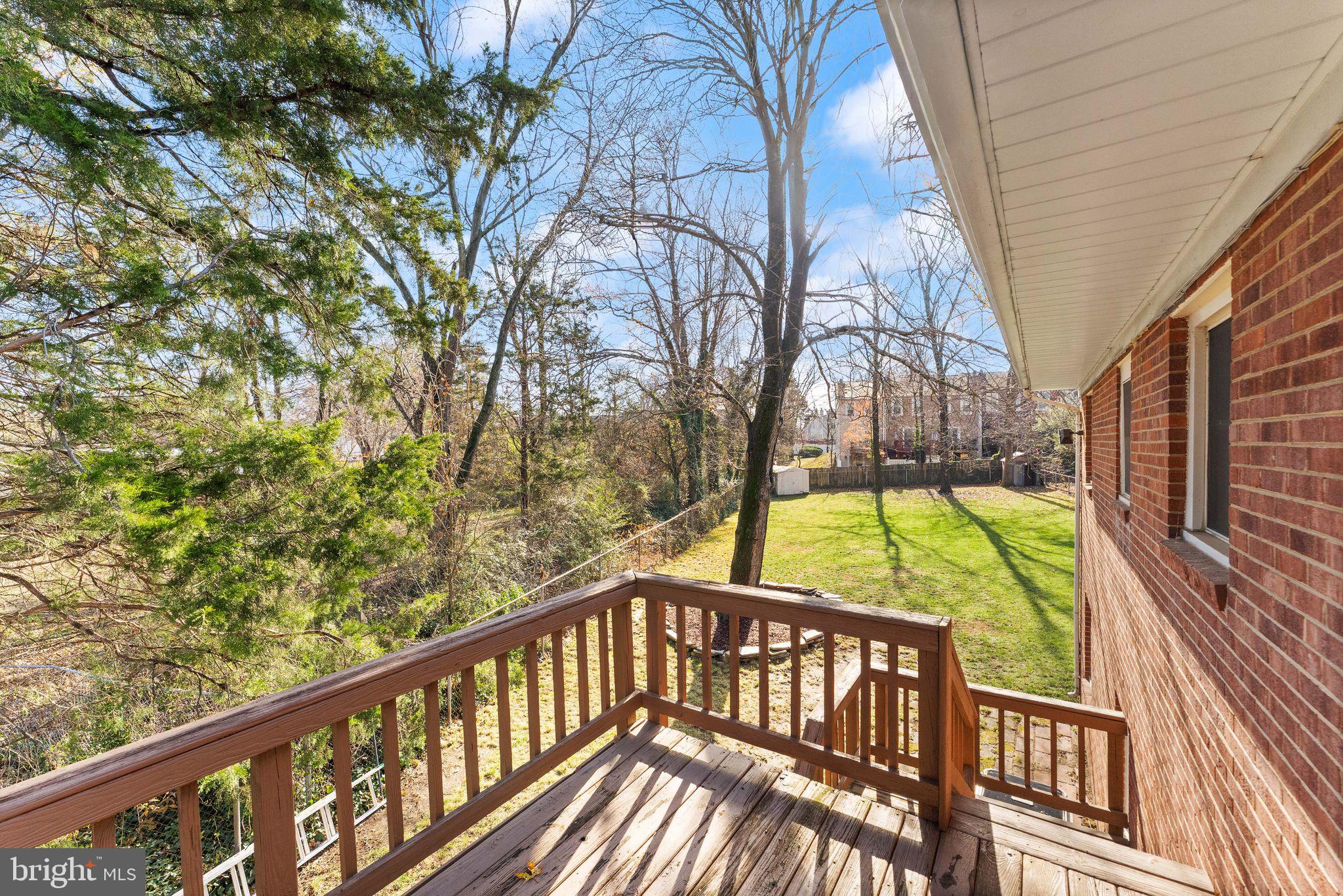6101 Briarview Court Alexandria, VA 22310 - Photo 38 of 44 a view of balcony with wooden floor and fence