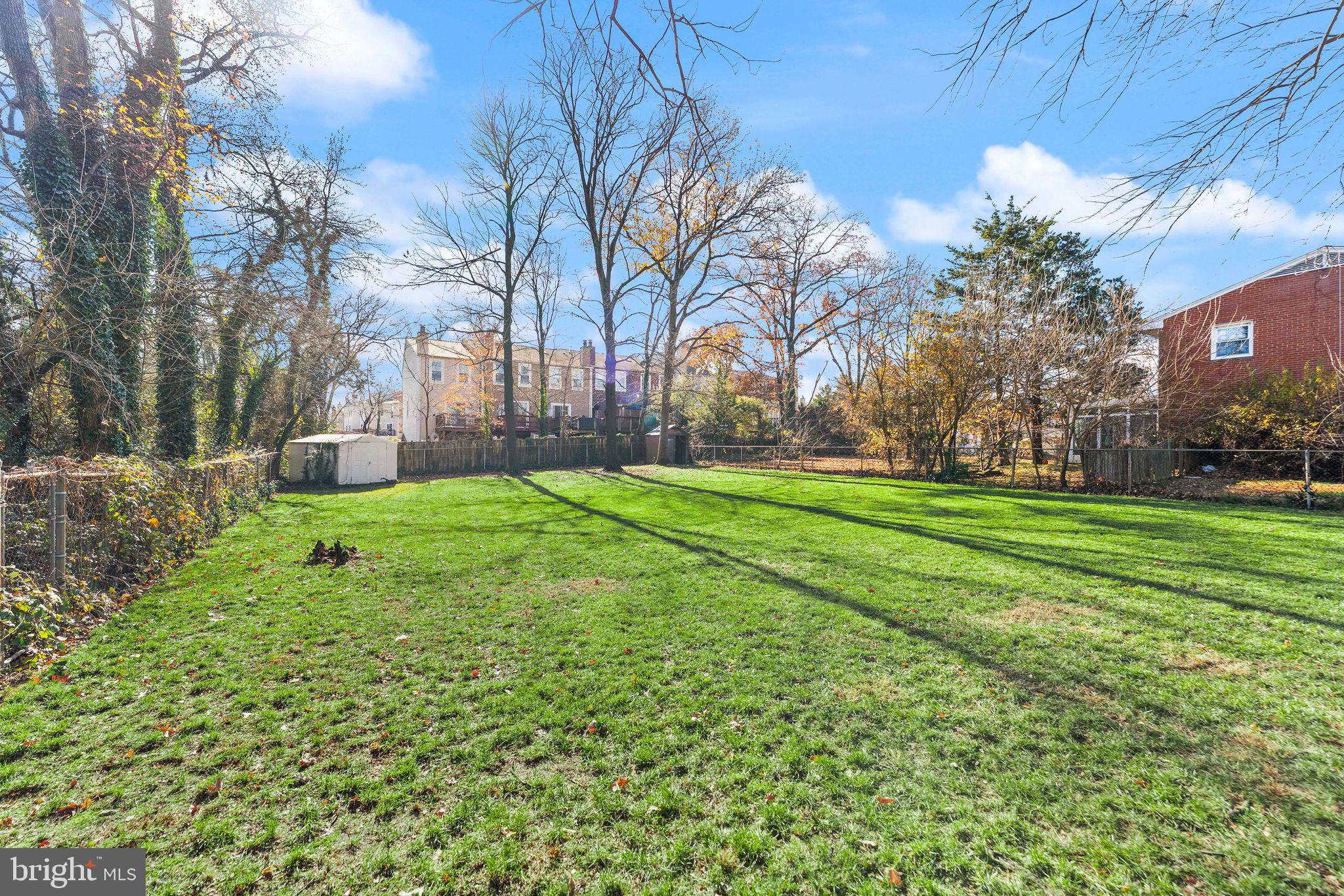 6101 Briarview Court Alexandria, VA 22310 - Photo 41 of 44 a backyard of a house with lots of green space