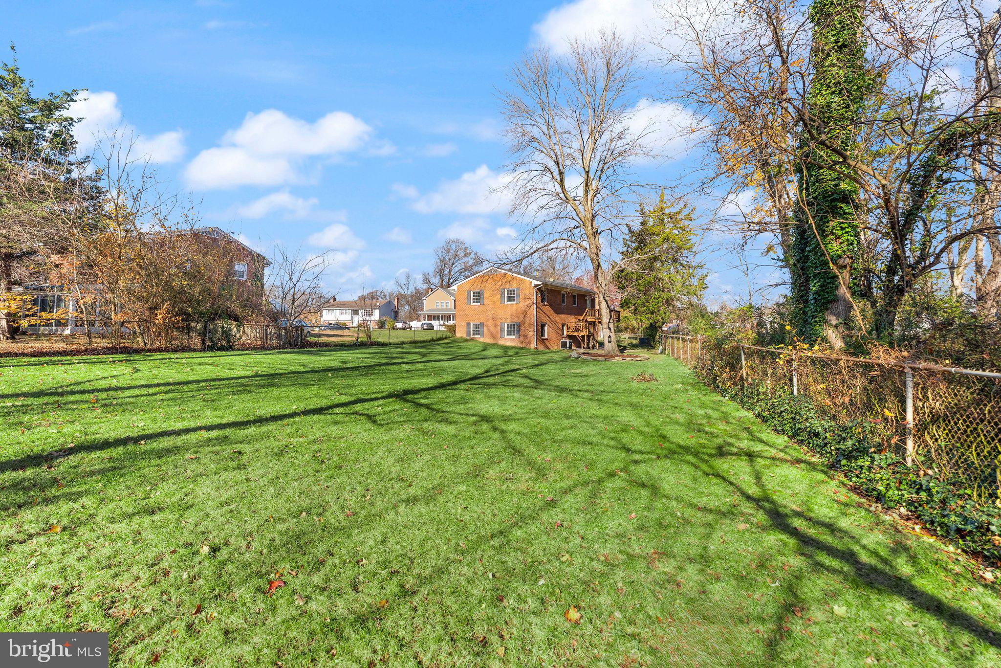 6101 Briarview Court Alexandria, VA 22310 - Photo 42 of 44 a view of a golf course with a lake