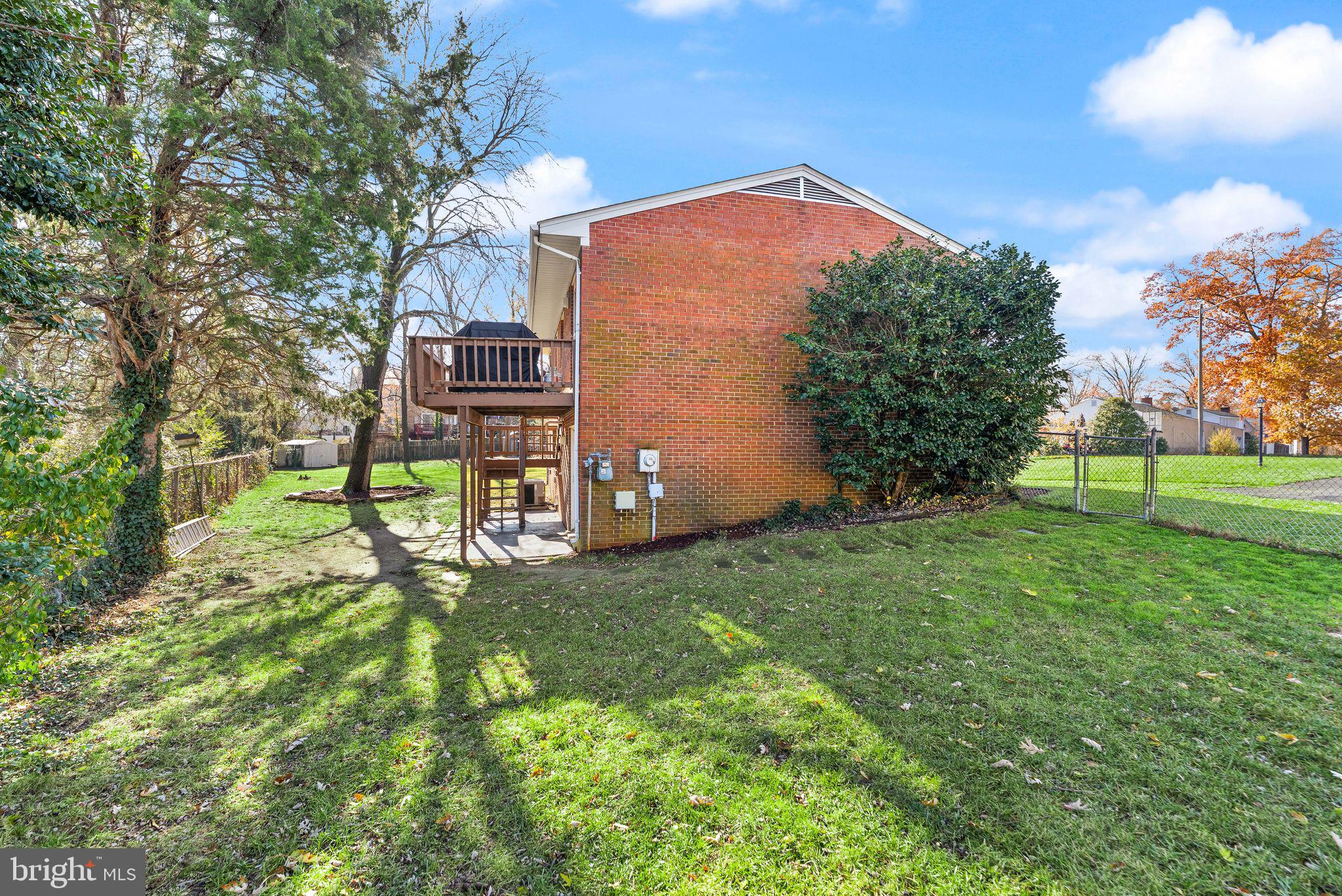 6101 Briarview Court Alexandria, VA 22310 - Photo 43 of 44 a backyard of a house with table and chairs