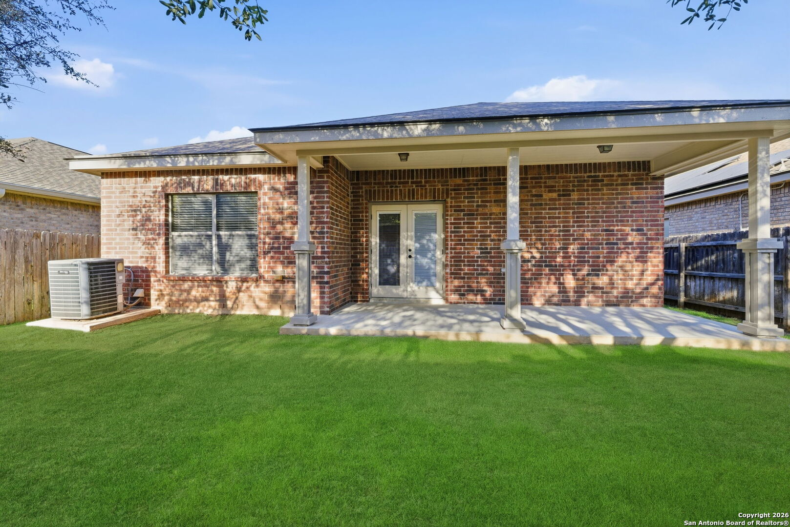 10510 Corvey Lane Helotes, TX 78023 - Photo 23 of 40 a view of a house with backyard and porch