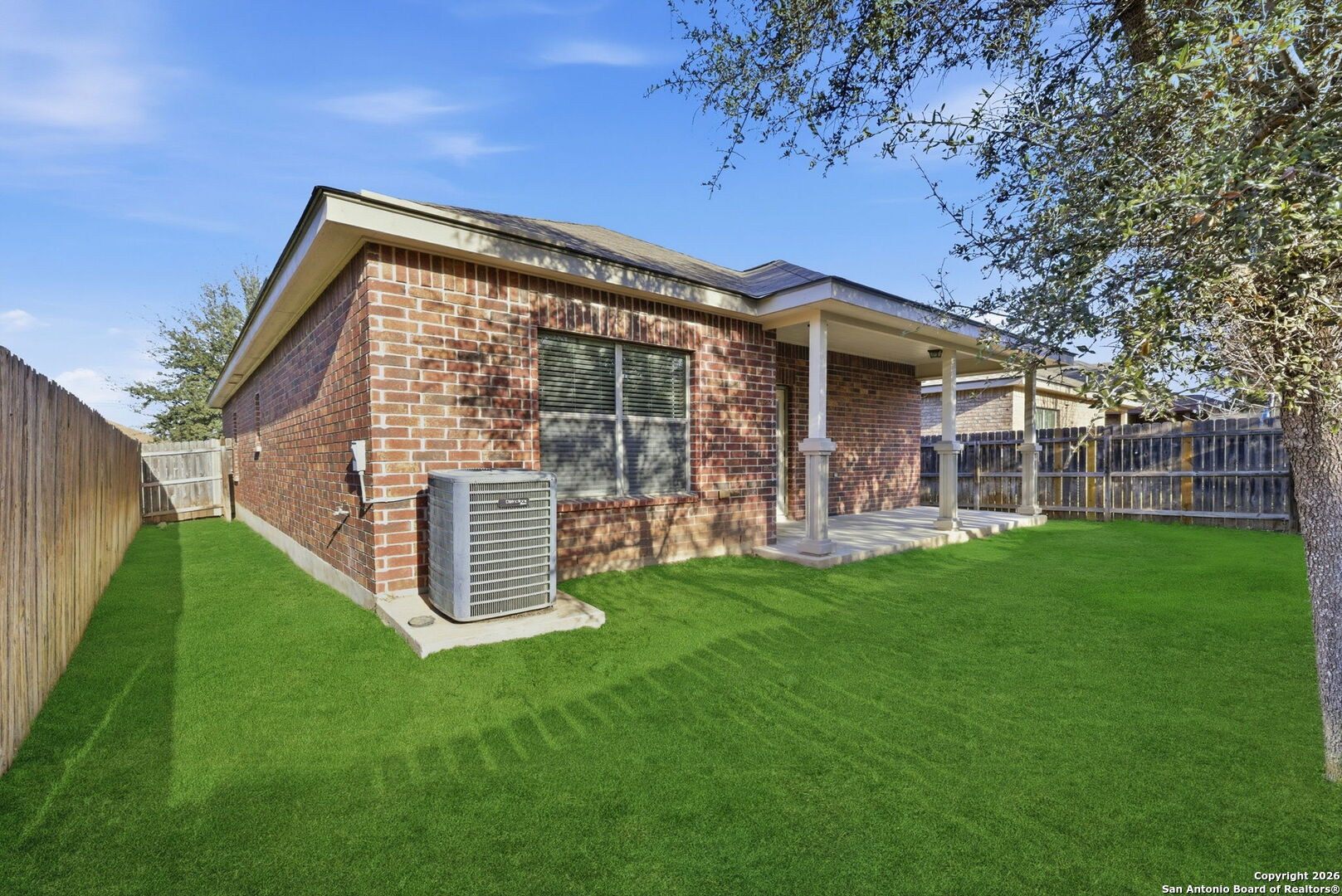 10510 Corvey Lane Helotes, TX 78023 - Photo 24 of 40 a front view of a house with a garden