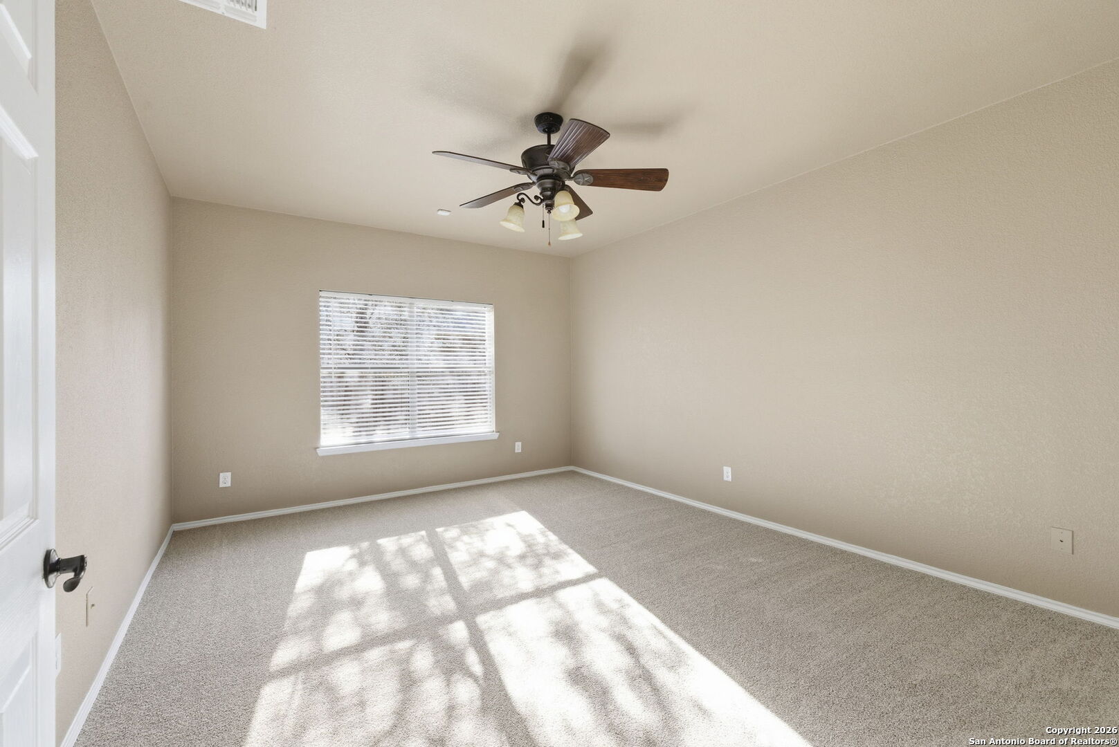 10510 Corvey Lane Helotes, TX 78023 - Photo 27 of 40 a view of an empty room with a window