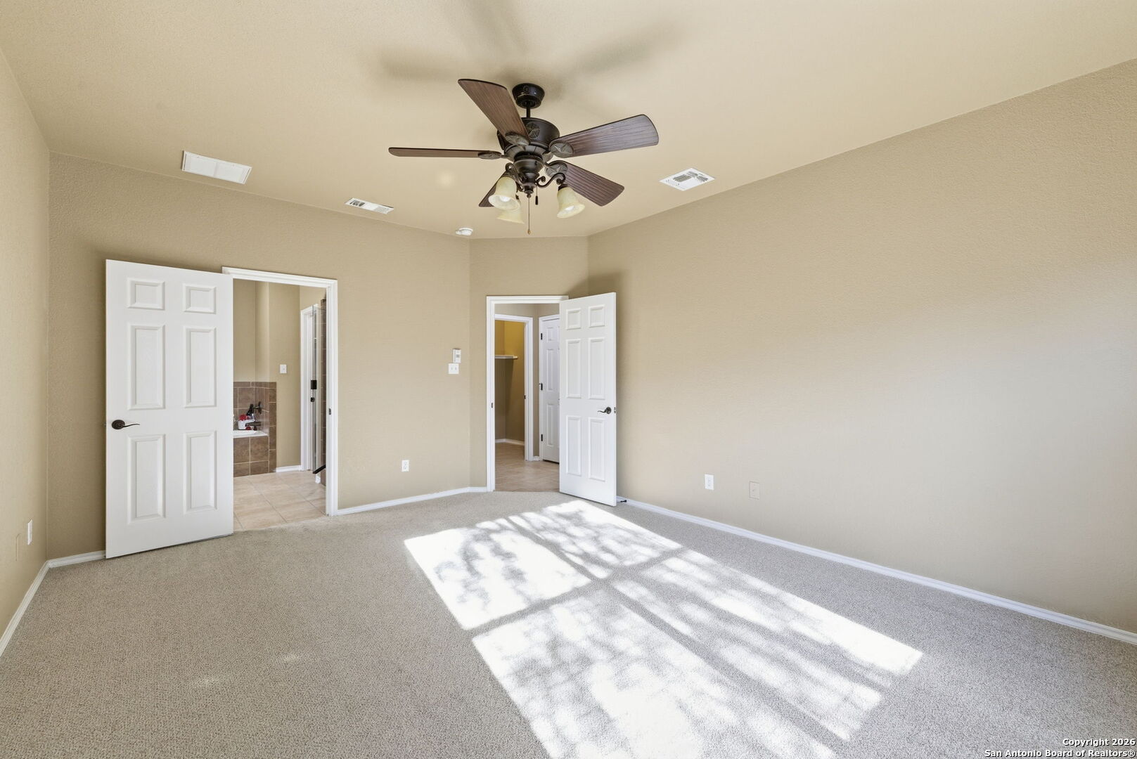 10510 Corvey Lane Helotes, TX 78023 - Photo 28 of 40 a view of a livingroom with a ceiling fan and window