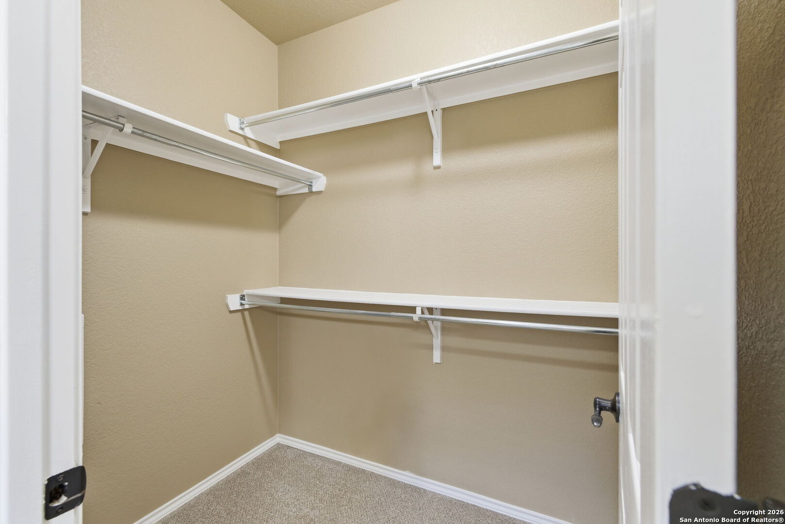 10510 Corvey Lane Helotes, TX 78023 - Photo 33 of 40 a view of a room with racks on the wall