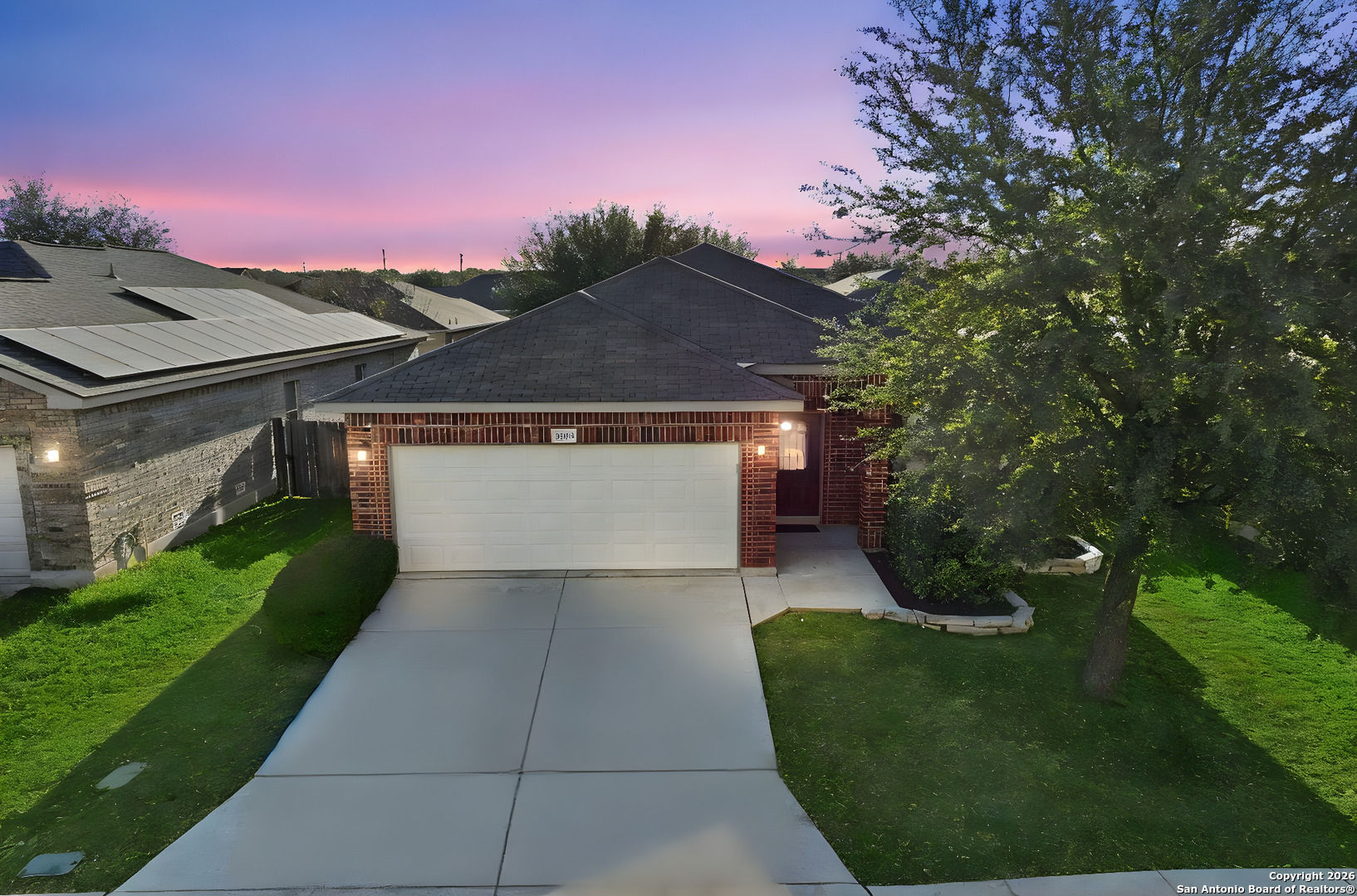 10510 Corvey Lane Helotes, TX 78023 - Photo 39 of 40 a view of a house with a yard plants and large tree