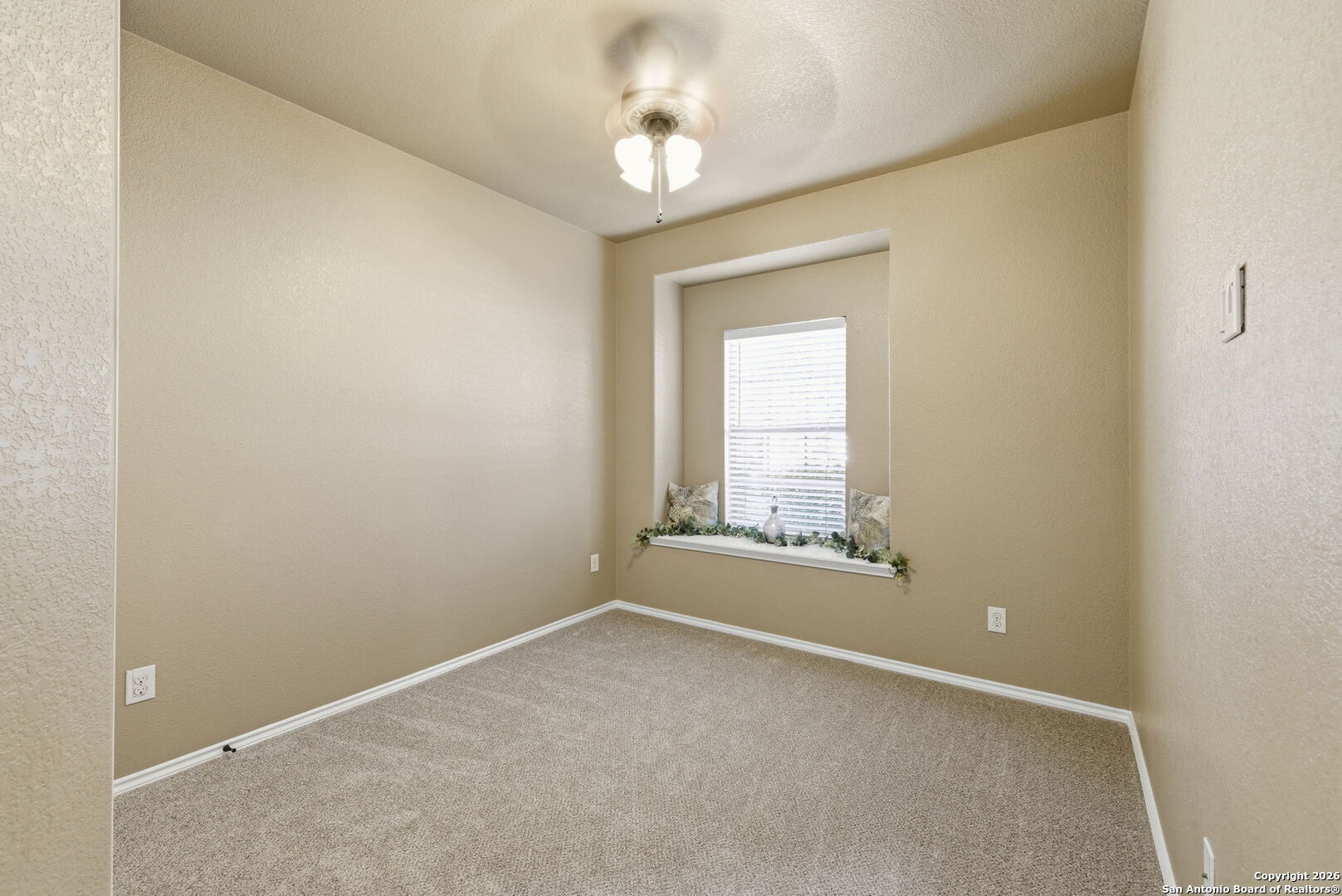 10510 Corvey Lane Helotes, TX 78023 - Photo 6 of 40 an empty room with a window