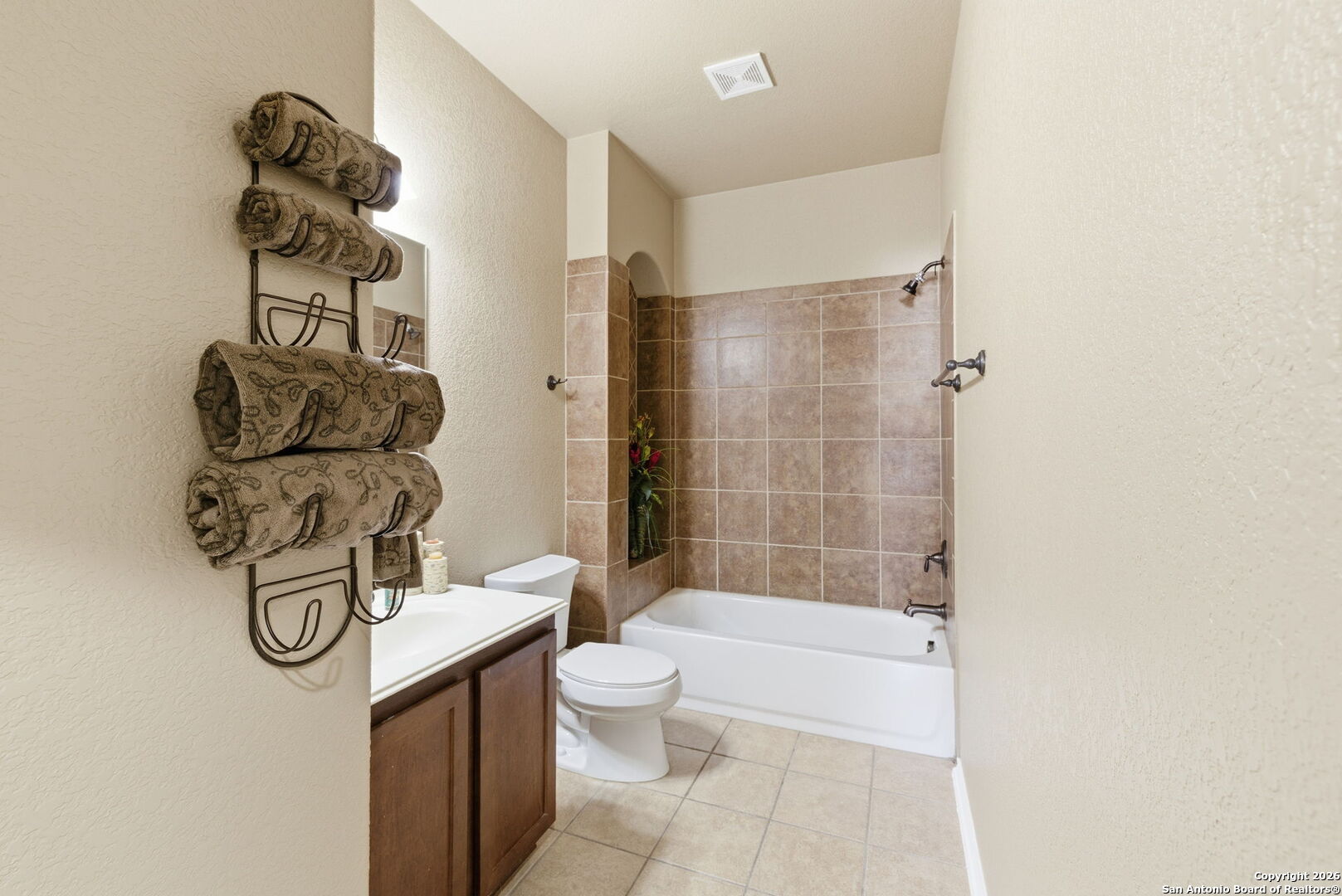 10510 Corvey Lane Helotes, TX 78023 - Photo 10 of 40 a bathroom with a shower a toilet and sink