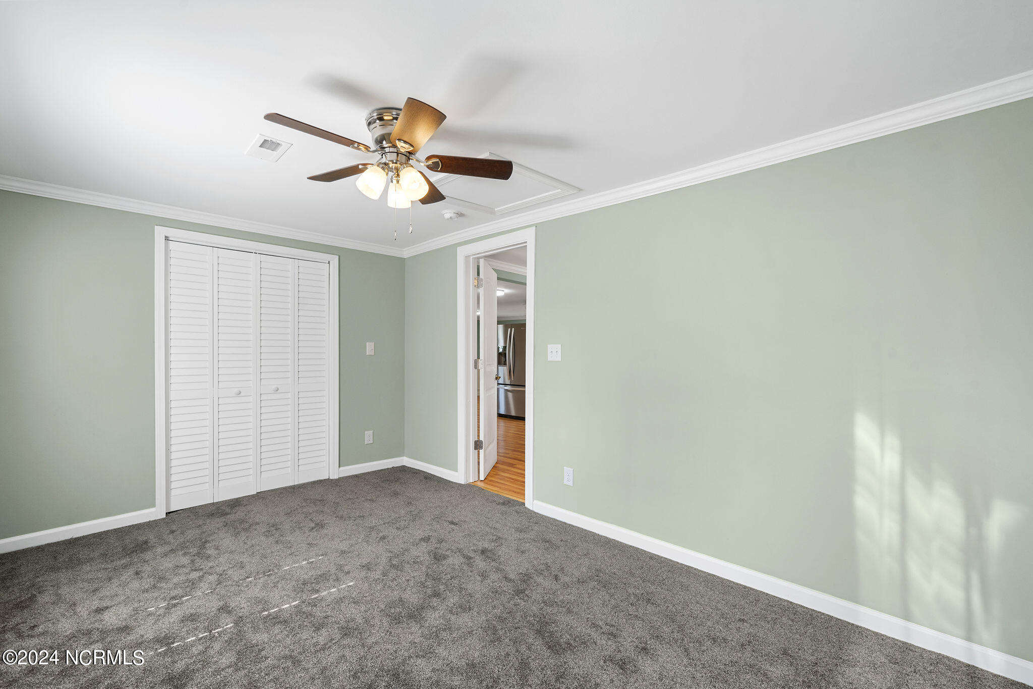 287 Murphys Store Road Rose Hill, NC 28458 - Photo 15 of 27 The Owner's Suite is in the rear of this adorable home. Great for relaxing