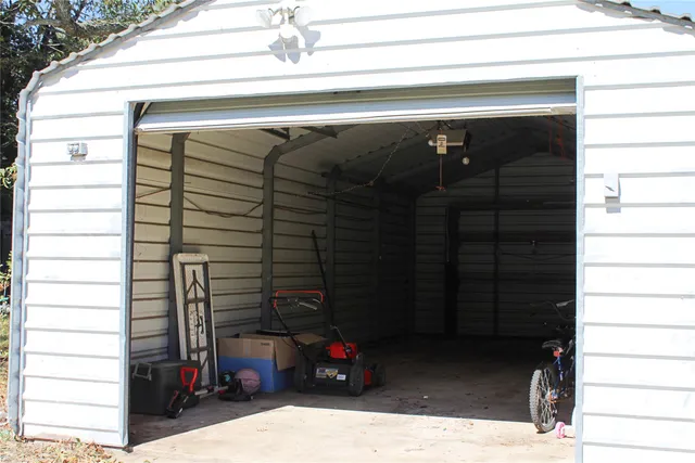 a bathroom with a shower and a mirror