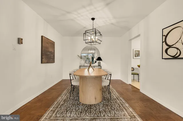a view of a living room and wooden floor