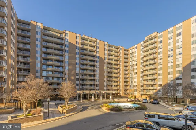 a front view of a building with street view