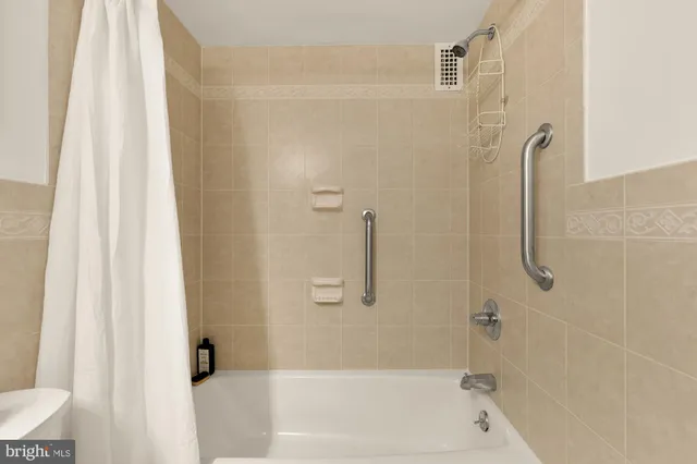 a bathroom with a bath tub