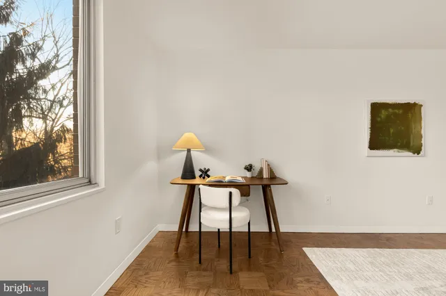 a room with a table and a chair