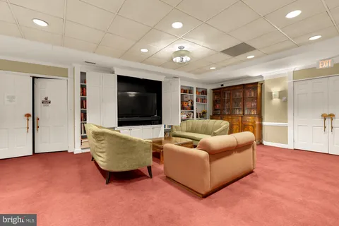 a room with furniture and a large window