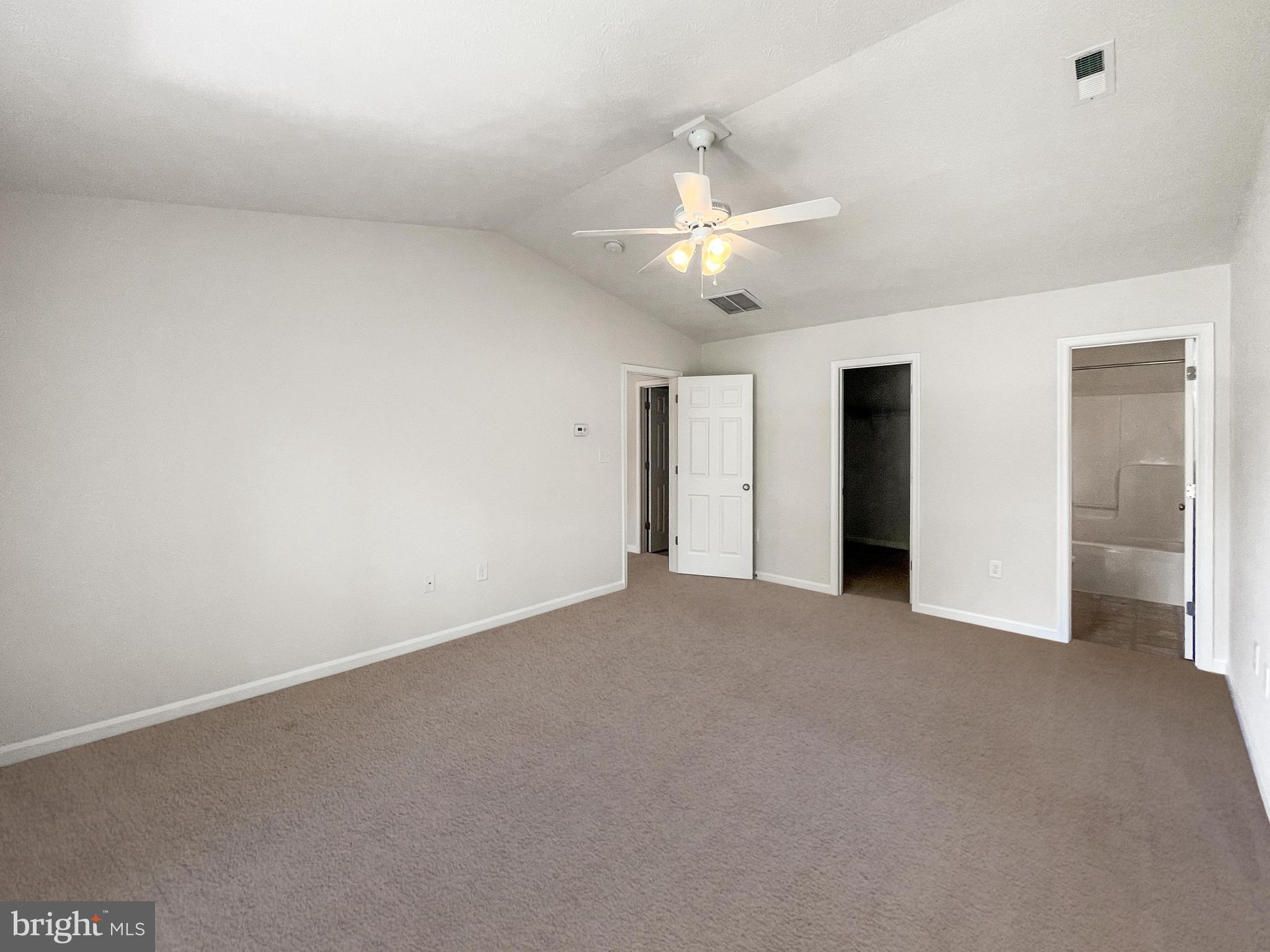 220 5th Street Colonial Beach, VA 22443 - Photo 11 of 25 wooden floor in an empty room