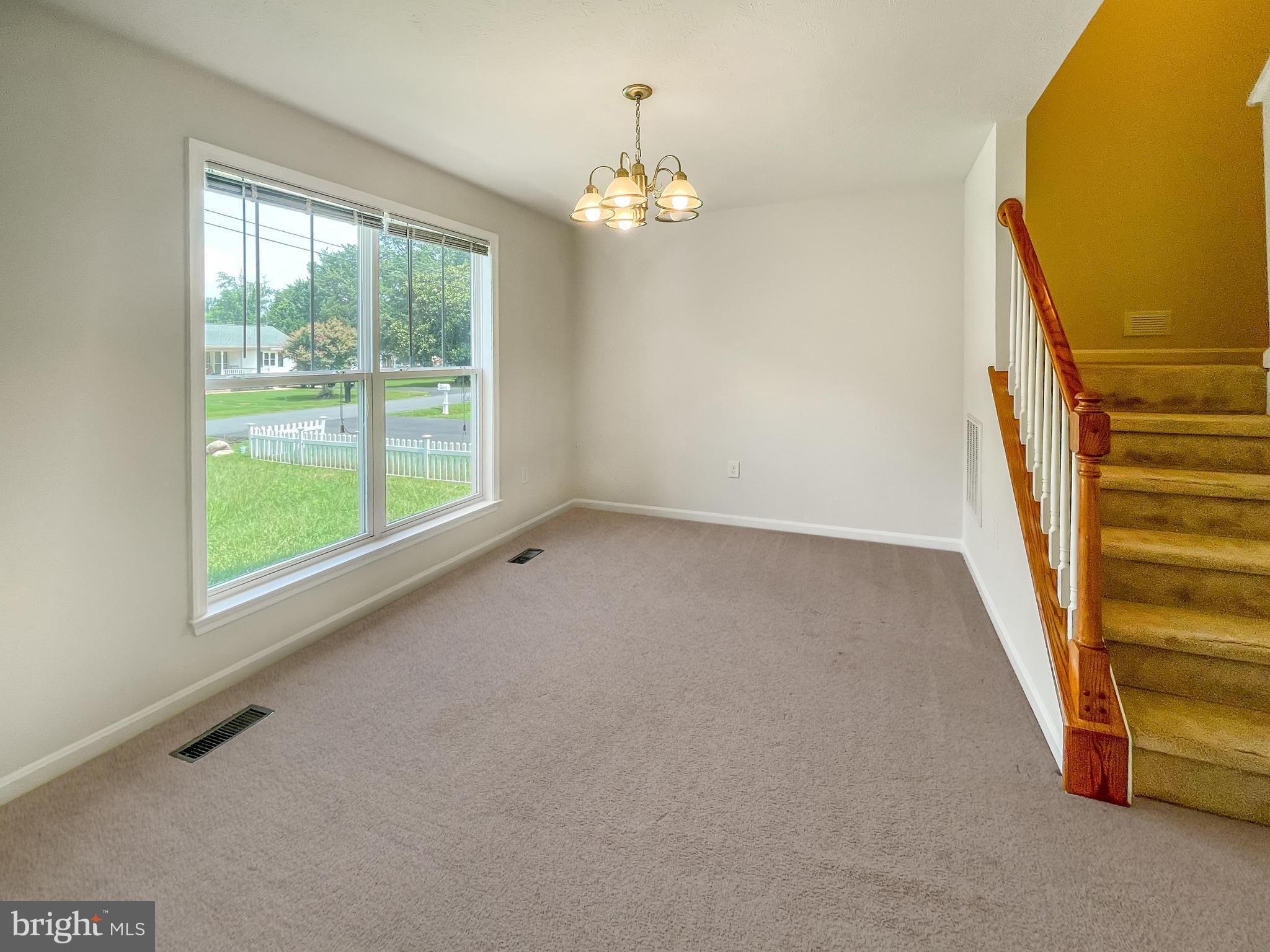 220 5th Street Colonial Beach, VA 22443 - Photo 12 of 25 an empty room with windows