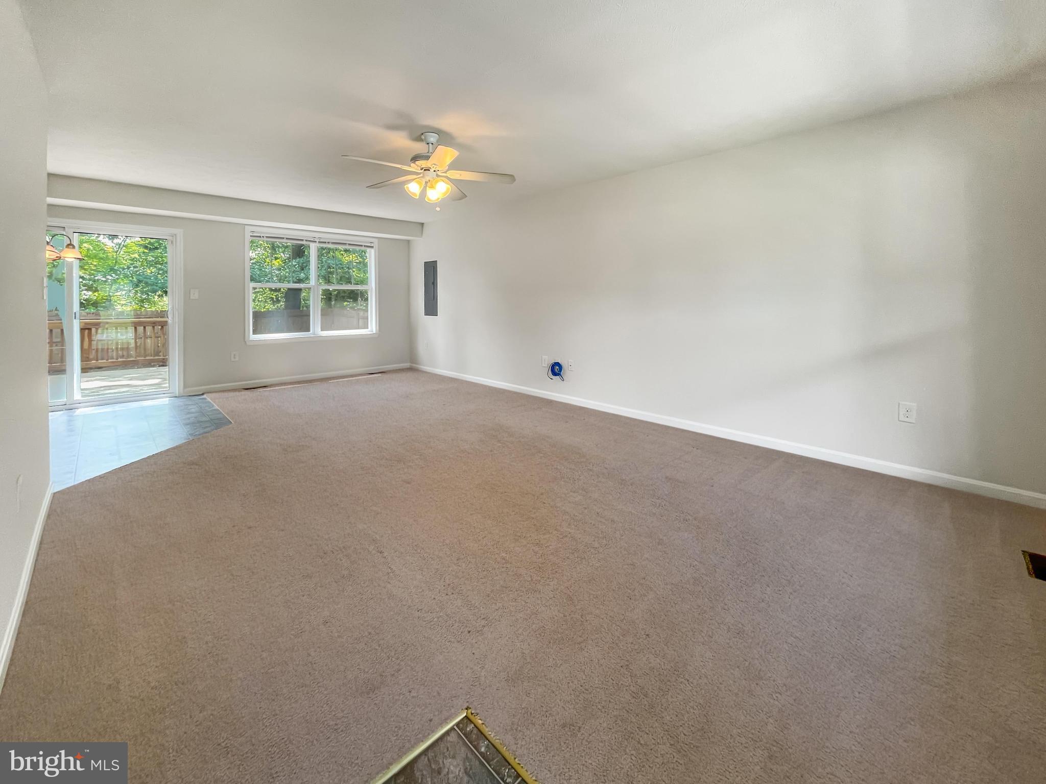 220 5th Street Colonial Beach, VA 22443 - Photo 14 of 25 an empty room with windows