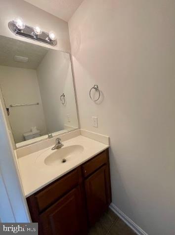 220 5th Street Colonial Beach, VA 22443 - Photo 17 of 25 a bathroom with a sink and a mirror