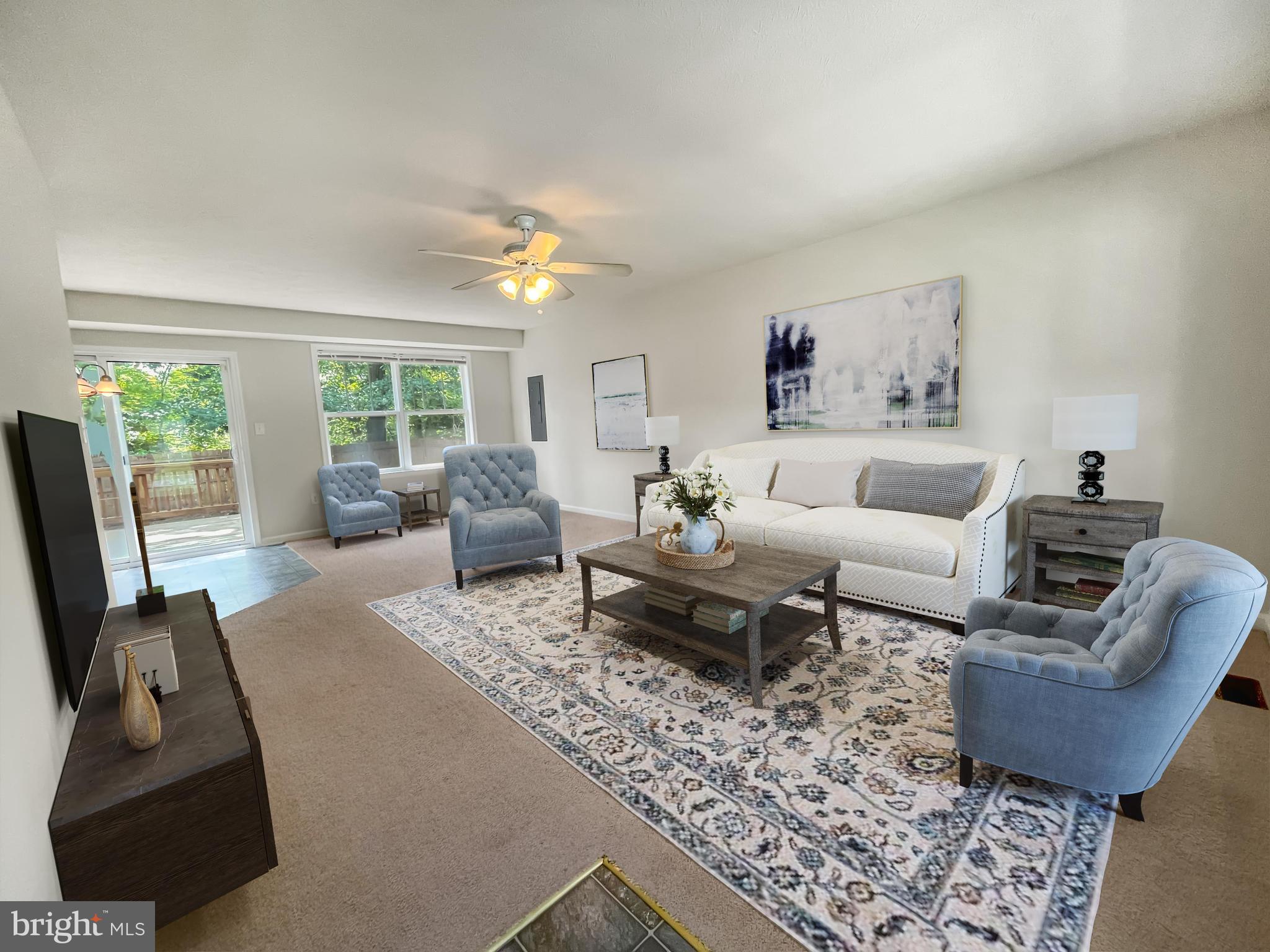 220 5th Street Colonial Beach, VA 22443 - Photo 2 of 25 a living room with furniture and a large window