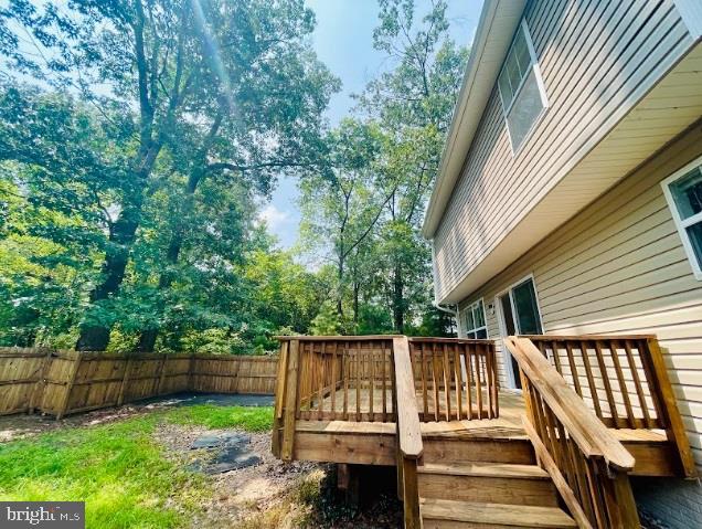 220 5th Street Colonial Beach, VA 22443 - Photo 21 of 25 a view of a backyard with a garden