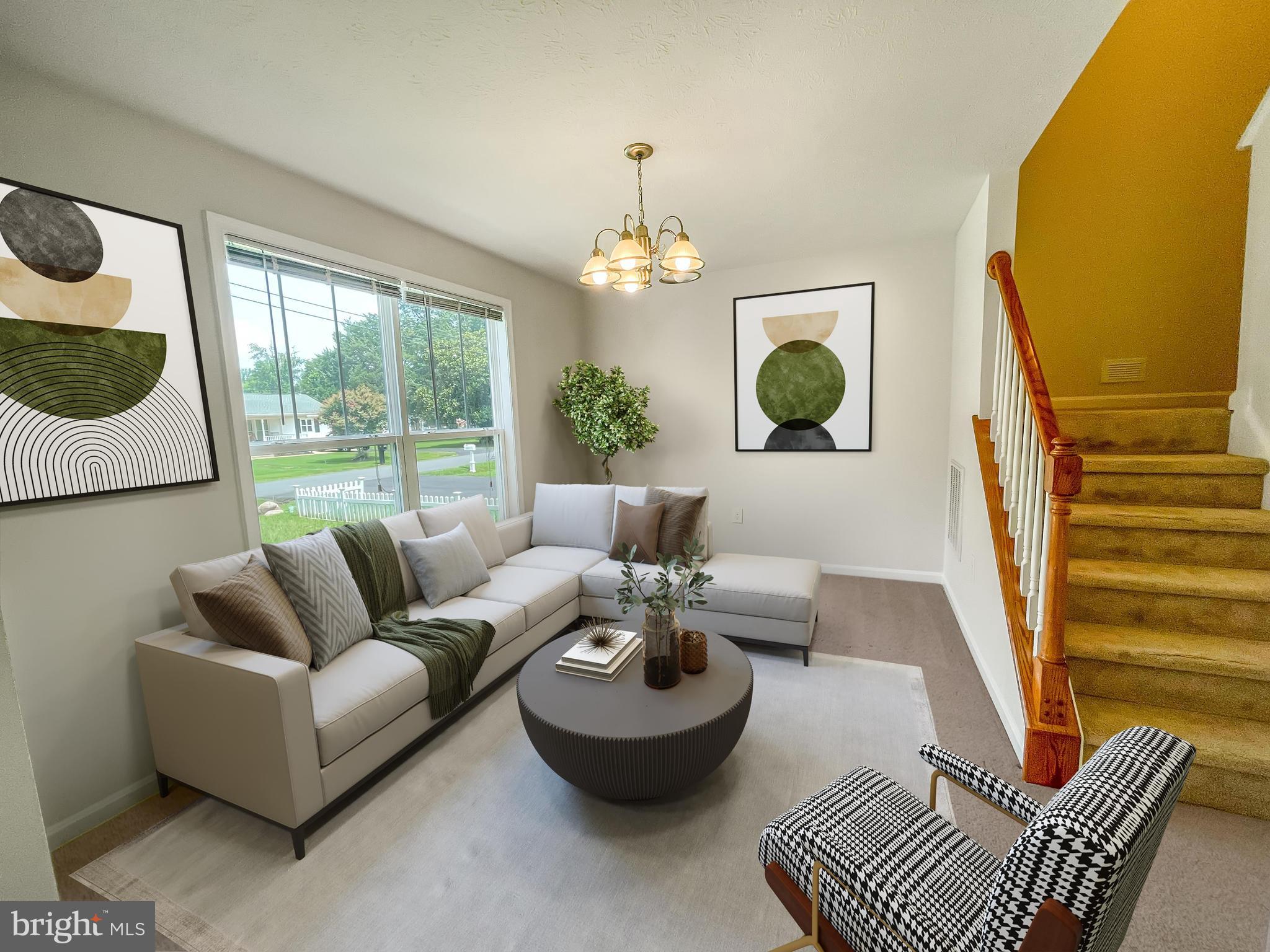 220 5th Street Colonial Beach, VA 22443 - Photo 3 of 25 a living room with furniture and a window