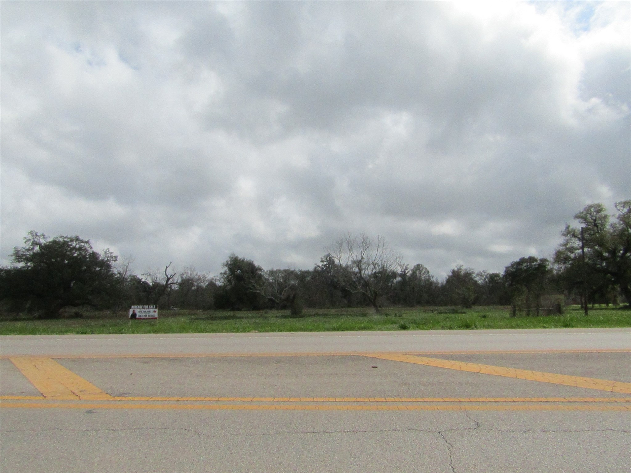 2481 FM 521 Road Brazoria, TX 77422 - Photo 7 of 9 an outdoor view with a road