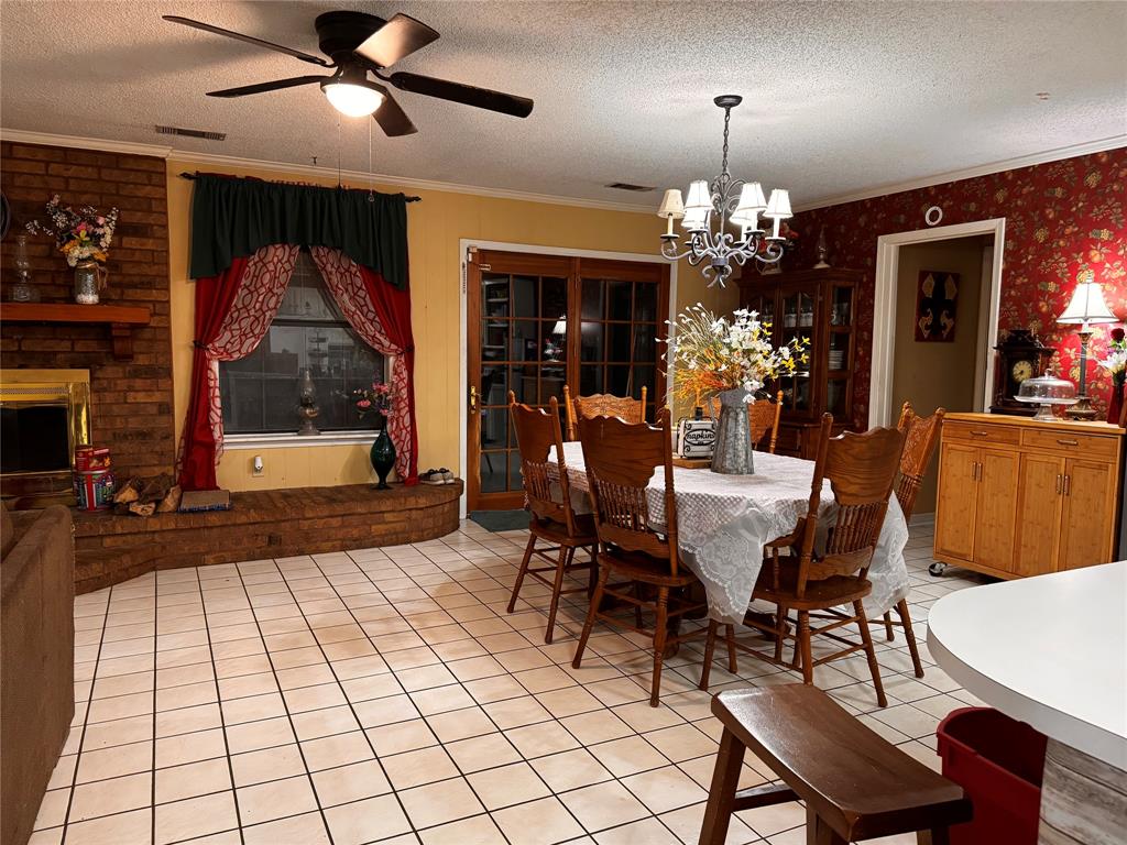 620 Fort Avenue Minden, LA 71055 - Photo 4 of 7 a view of a dining room with furniture window and wooden floor