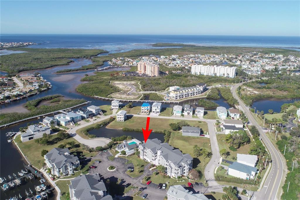 5727 Biscayne Court, Unit 302 New Port Richey, FL 34652 - Photo 4 of 45 an aerial view of a city