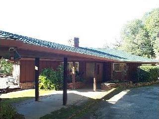 1451 Recreation Road Ukiah, CA 95482 - Photo 1 of 5 a front view of a house with a yard