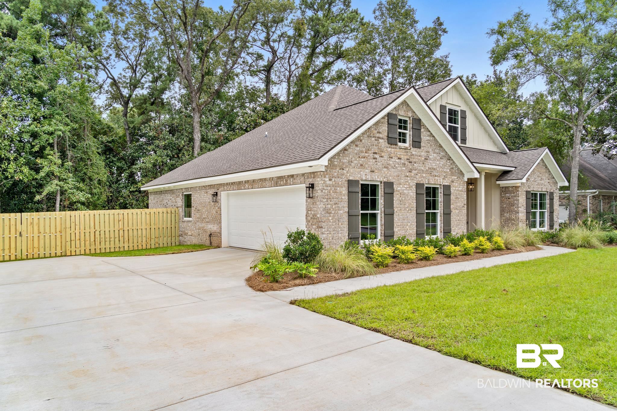 29 Signal Hill Road Daphne, AL 36527 - Photo 3 of 36 View of front of house featuring a front yard and a garage