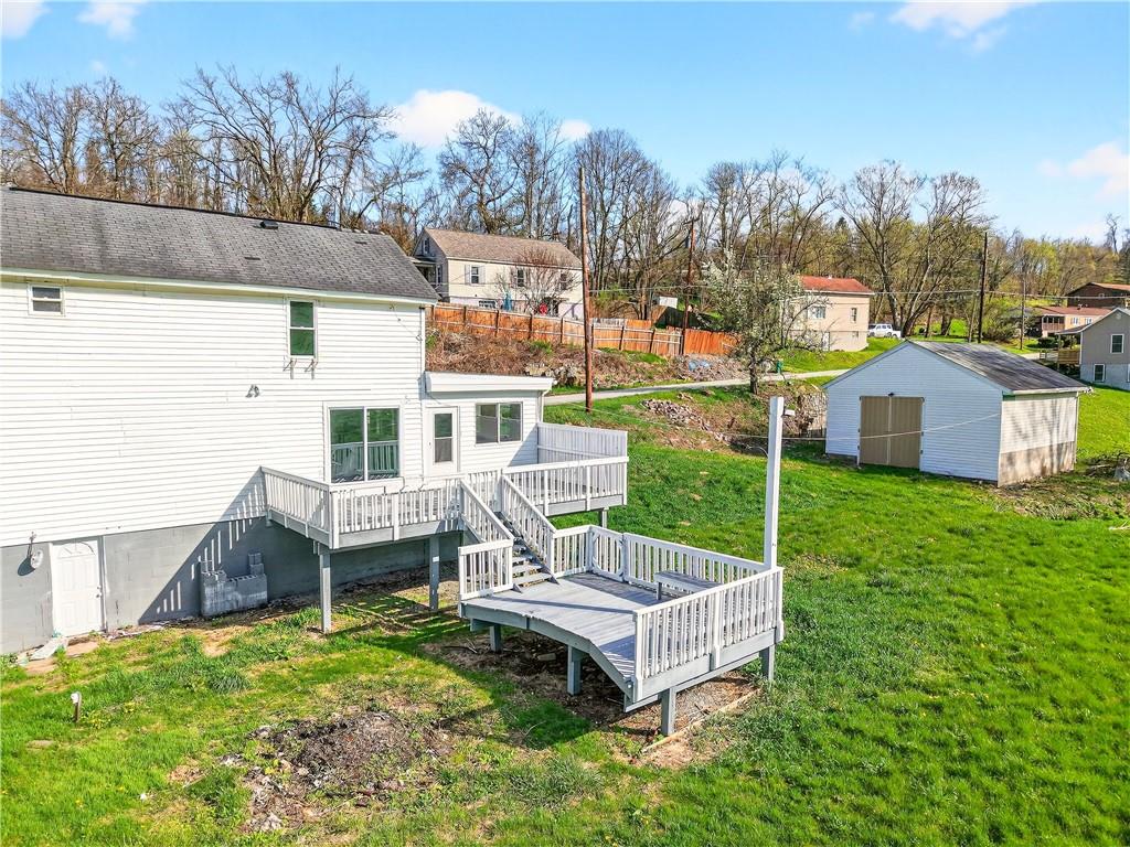 93 Old 51 Road Perryopolis, PA 15473 - Photo 6 of 44 a front view of a house with garden