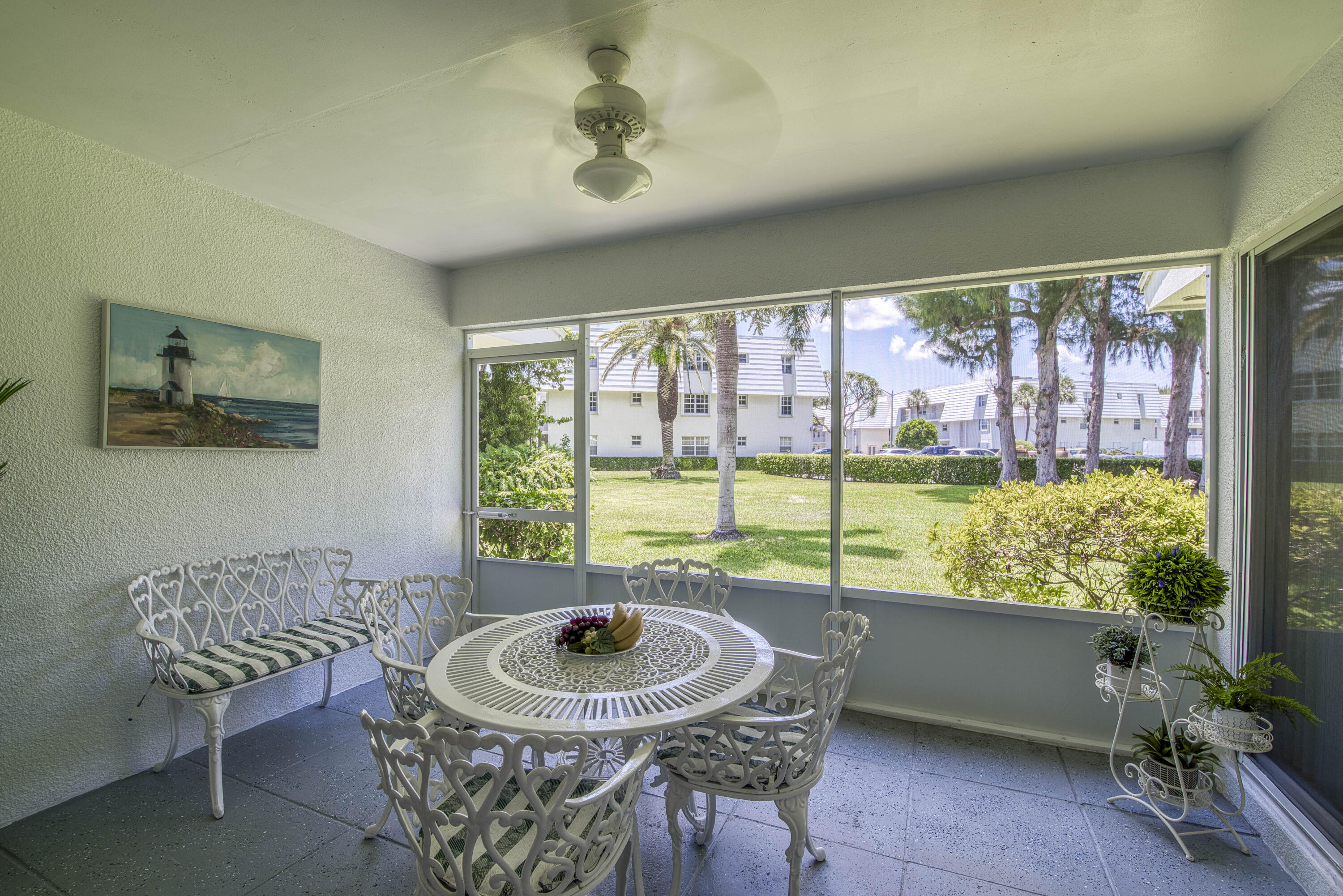 1205 Sandy Lane, Unit 149 Singer Island, FL 33404 - Photo 8 of 28 a view of a dining room with furniture window and outside view