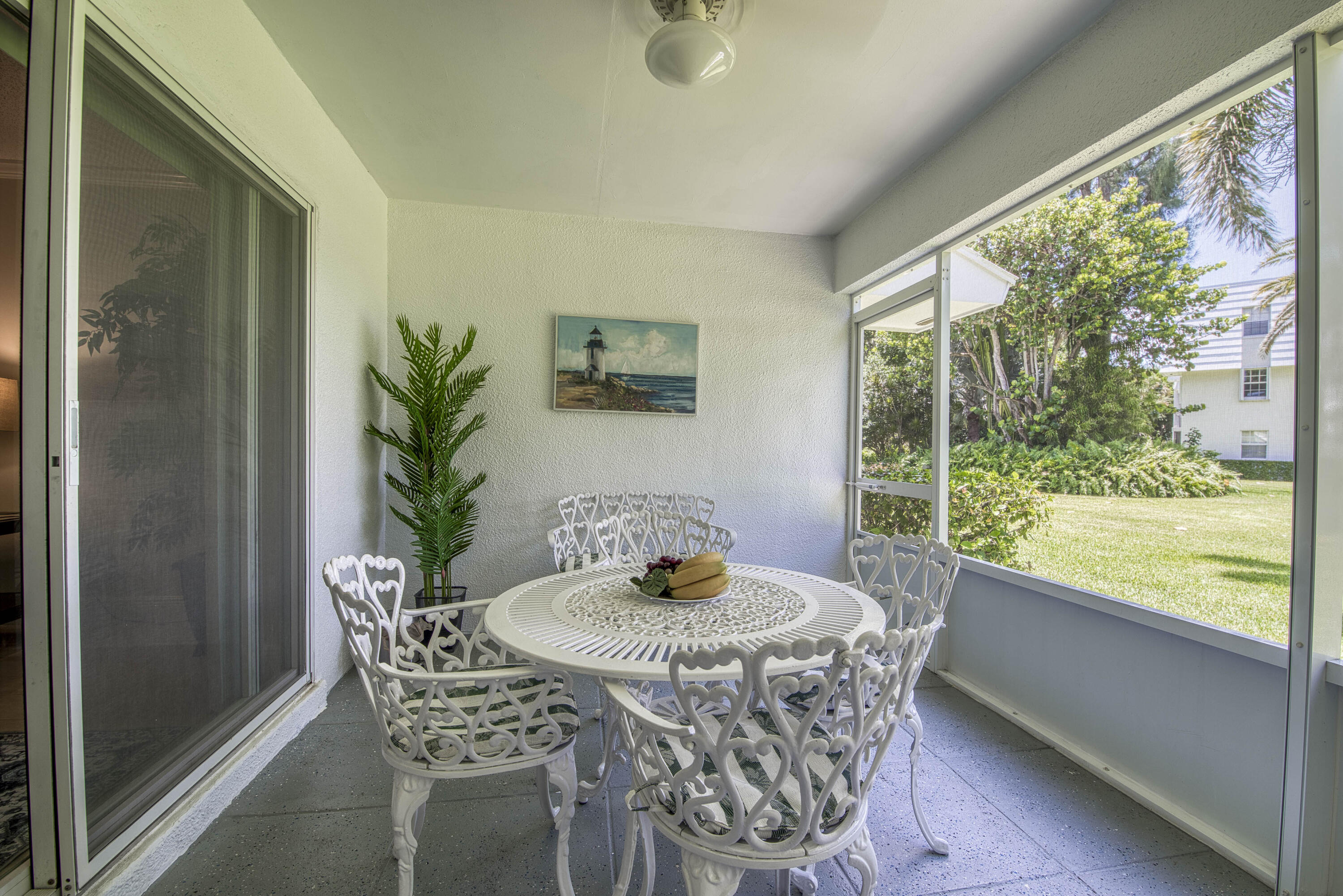1205 Sandy Lane, Unit 149 Singer Island, FL 33404 - Photo 10 of 28 a dining room with furniture and window